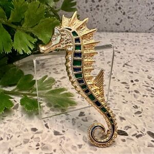 Seahorse brooch in gold tone